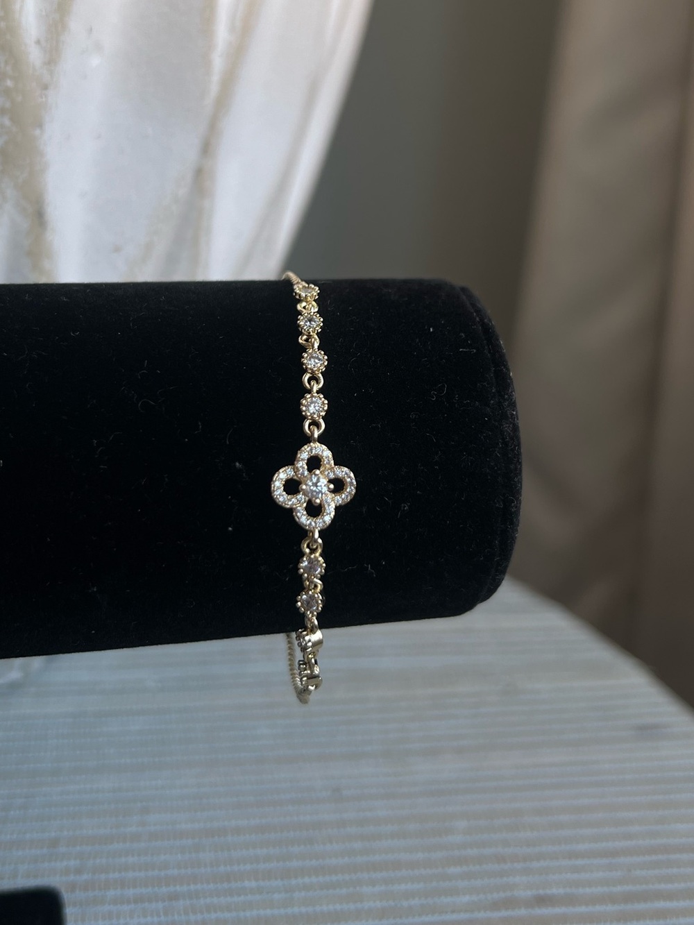 Adjustable gold floral with crystal accents bracelet